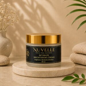 Nuvelle Intimate Brightening Cream 50 ml jar on a stone dish with soft botanicals
